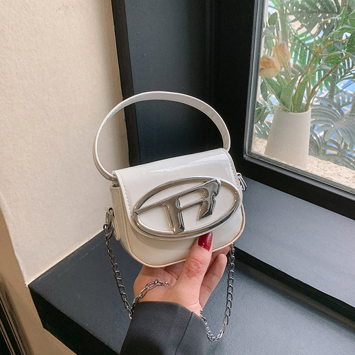 Wholesale New children's bag with glossy patent leather mini saddle bag, stylish women's chain crossbody bag, red envelope at the mouth