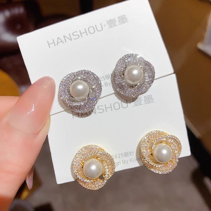 Wholesale Exquisite, fashionable, light luxury, super sparkling full diamond pearl spiral earrings, silver needle temperament, versatile and high-end earrings