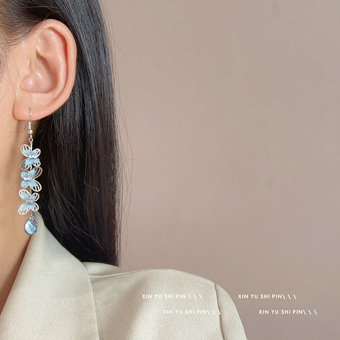 Wholesale Butterfly droplet pendant earrings with niche design, light luxury temperament, fashionable long tassel earrings