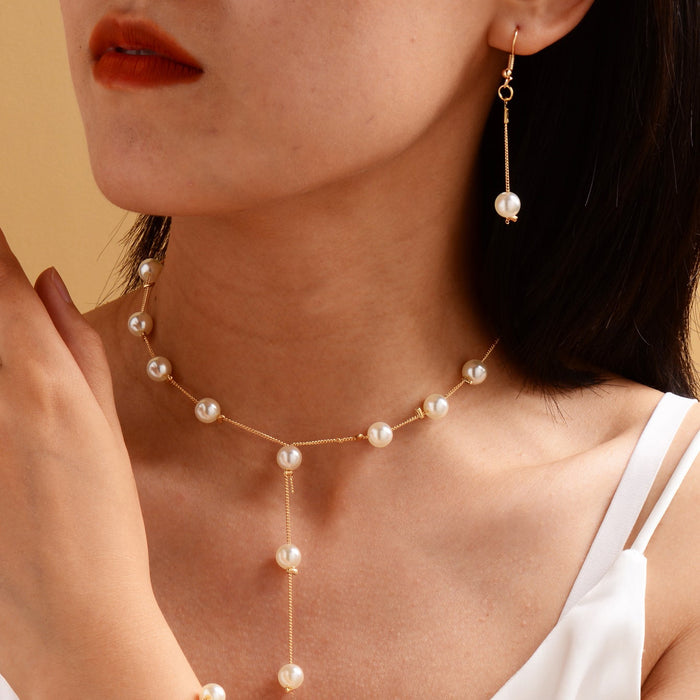 Wholesale Jewelry Fashion Pearl Pendant Alloy Luxury Pearl Earrings Bracelet Earrings Necklace Set