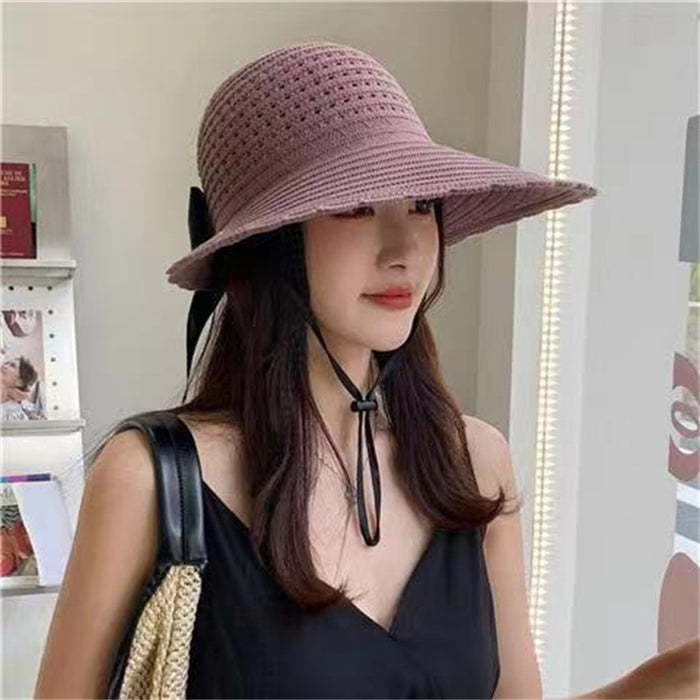 Wholesale New curled edge hollow knitted sun hat temperament bow top hat large brim foldable fisherman hat