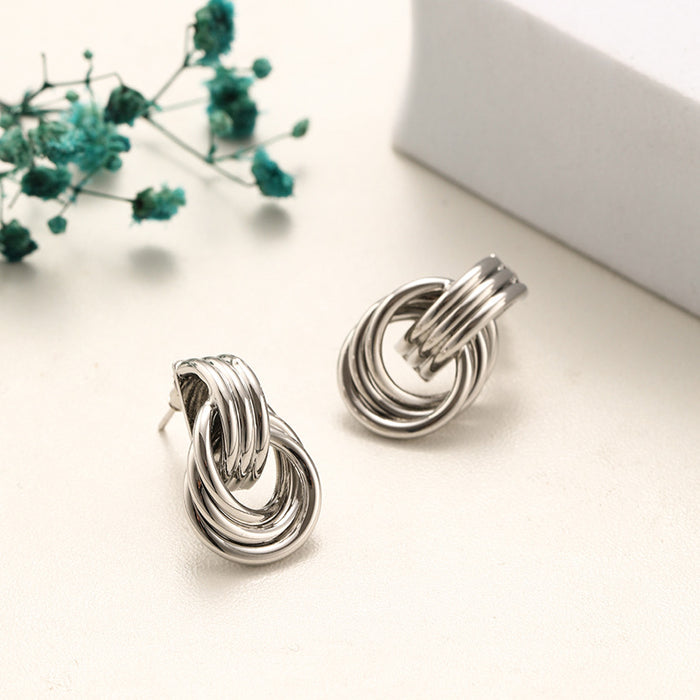 Wholesale Exaggerated double knot earrings, personalized copper plated earrings, niche high-end, light luxury temperament earrings