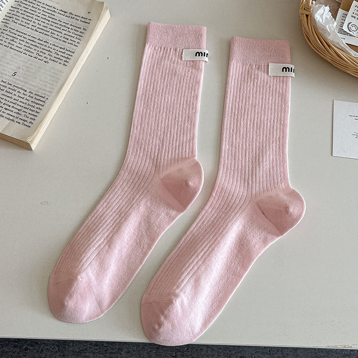 Wholesale Sock fabric label letter pile socks college style versatile colorful mid tube socks