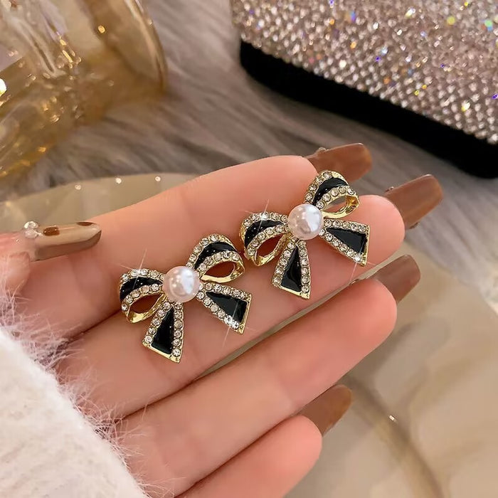 Wholesale Silver needle studded diamond bow earrings, light luxury, high-end retro fashion temperament, earrings, personalized earrings wholesale
