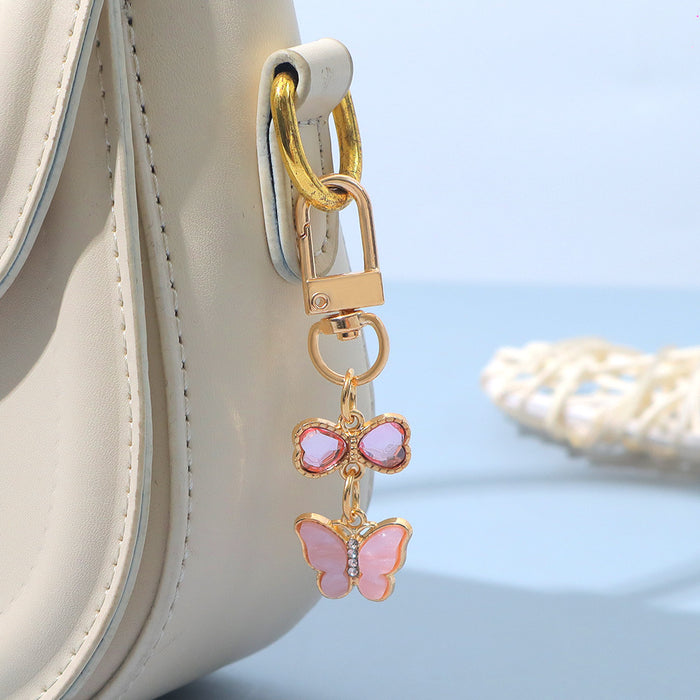 Wholesale Keychain Pendant Creative Alloy Butterfly Headphone Mobile Phone Bag Pendant