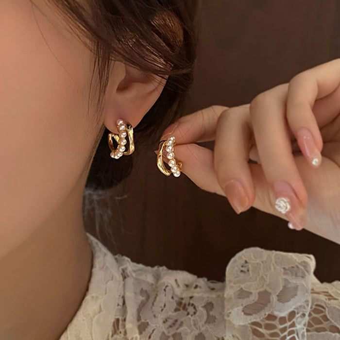 Wholesale Irregular double-layer pearl earrings with feminine temperament, plain face earrings, silver needles