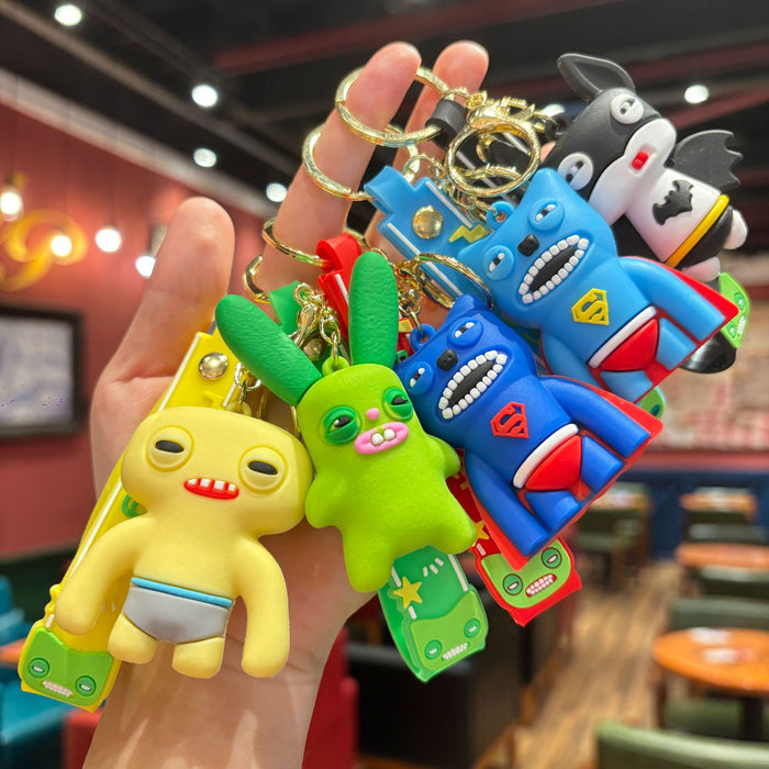Wholesale Cartoon cute monster series girls cute keychain pendant funny doll keychain student doll small pendant