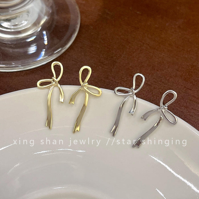 Wholesale Simple bow earrings girl fashion Joker cold wind earrings