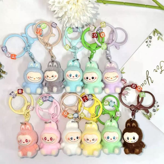 Wholesale flocked cute key doll keychain