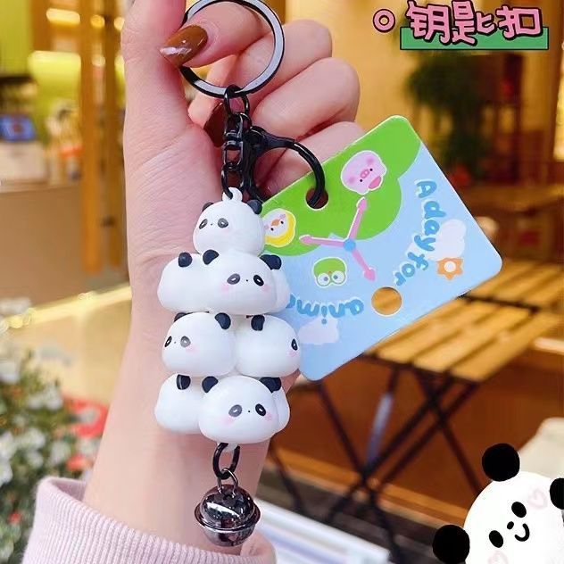 Wholesale Popular creative cute pet jengle garden doll cartoon couple schoolbag pendant car key chain small gift