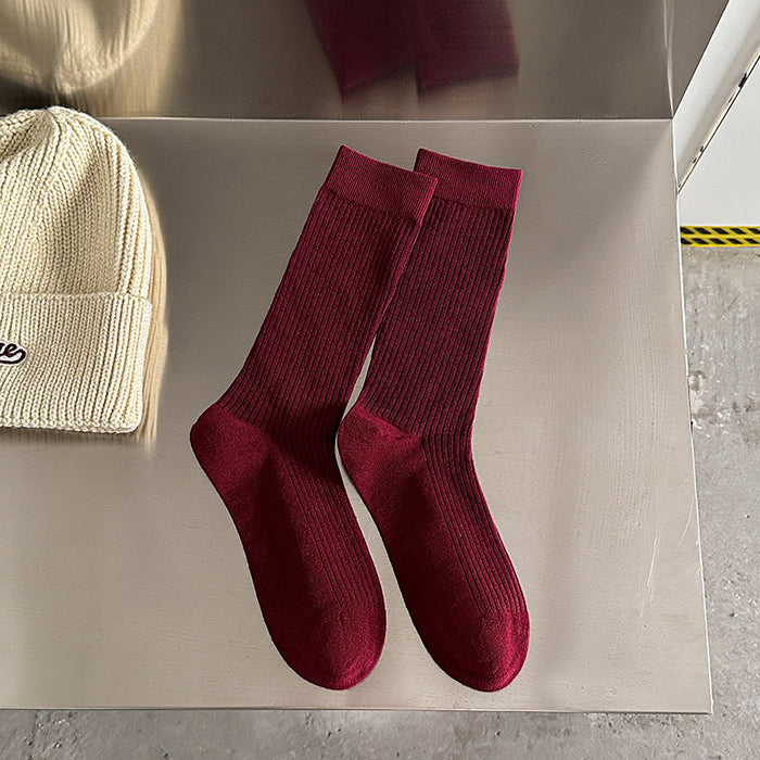 Wholesale Red socks with a pile of socks and polka dots