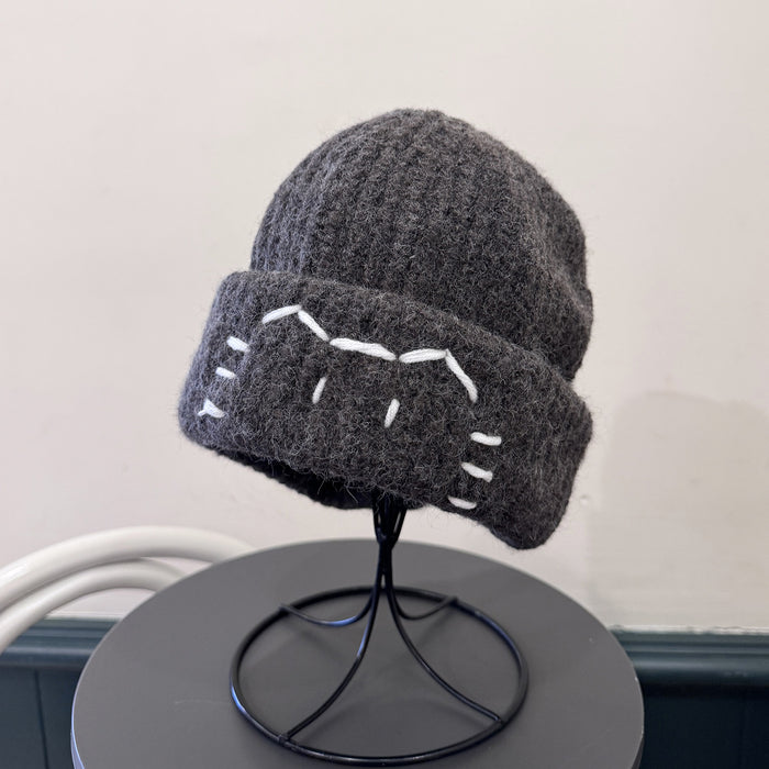 Wholesale Cute kitten embroidered knitted hat