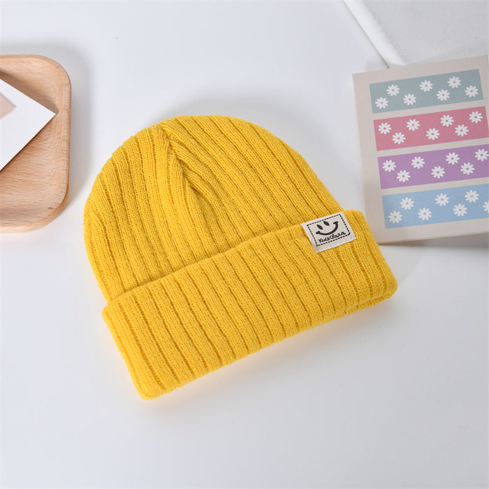 Wholesale Casual, fashionable, warm knit hat, cute smiling face pullover hat