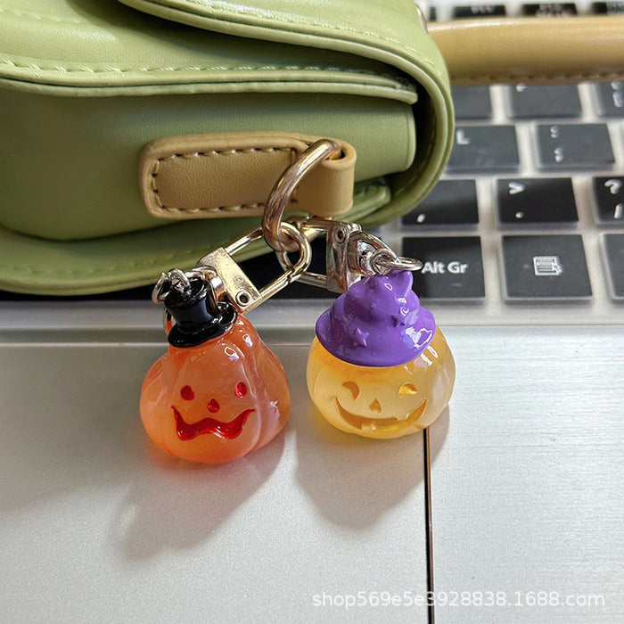 Wholesale Novelty  Pumpkin Pendant Keychain Glow In The Dark Resin Black Hat Design Bag And Earphone Case Charm Gift For Students And Couples