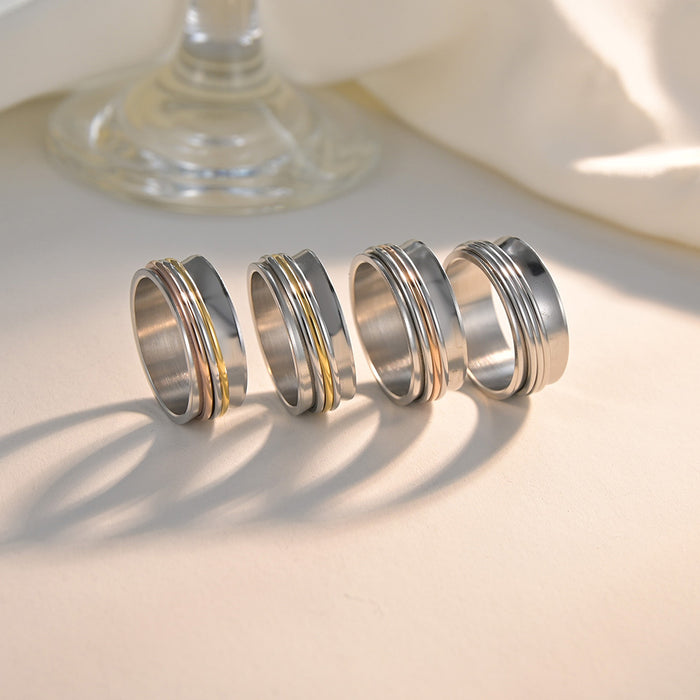 Wholesale Concave Three-color Three-ring Rotating Titanium Steel Ring JDC-RS-YuYuan005