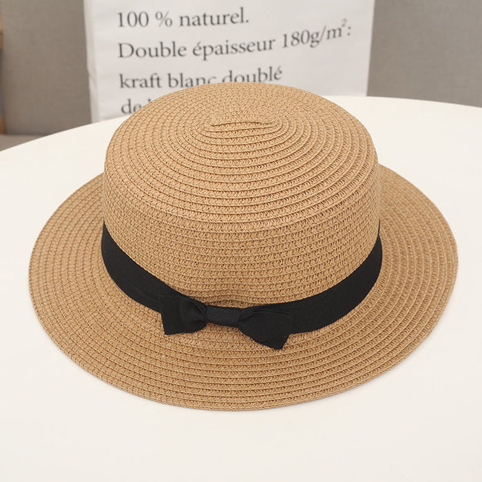 Wholesale New wide eave flat top straw hat for sun protection, vacation bow top hat for versatile sun protection