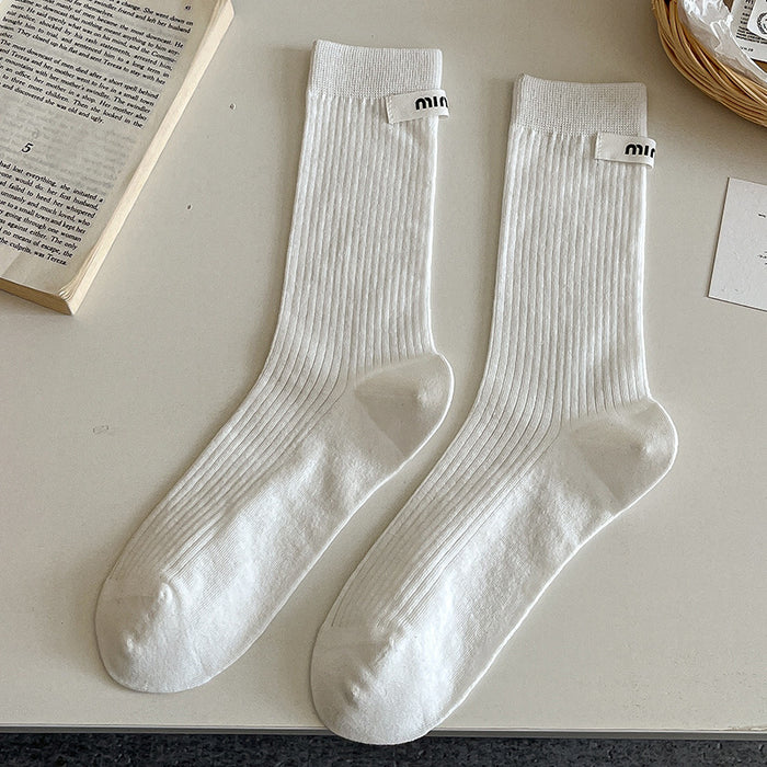 Wholesale Sock fabric label letter pile socks college style versatile colorful mid tube socks