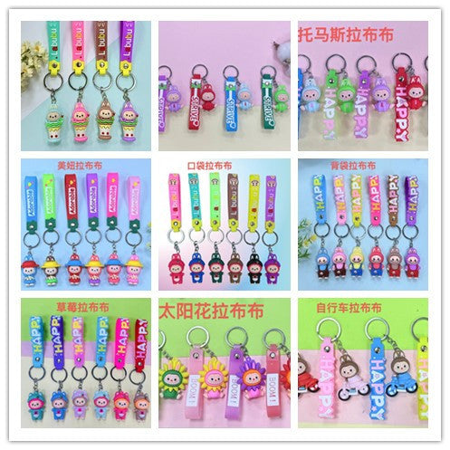 Wholesale Cute cartoon silicone keychain with cute little monster keychain for sweatshirt