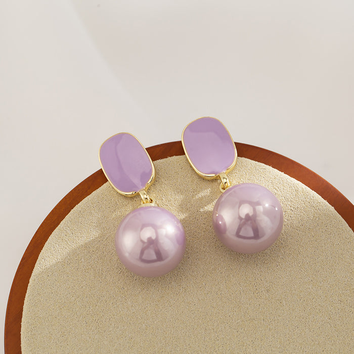Wholesale Purple pearl earrings with a light luxury and high-end feel. Mosquito coil without ear holes and ear clips