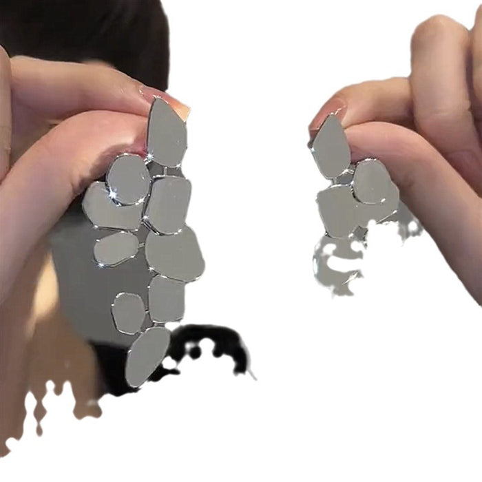 Wholesale Alloy exaggerated fashionable simple irregular leaf earrings for women