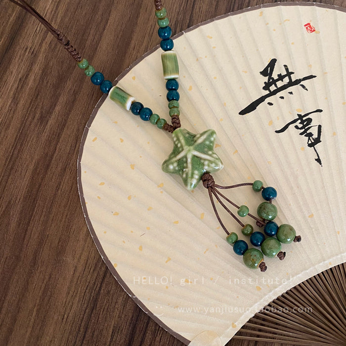Wholesale Colorful ceramic bead star necklace, long sweater chain accessory