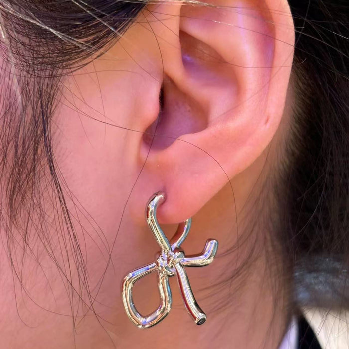 Wholesale Women' s Planet Bow Earrings