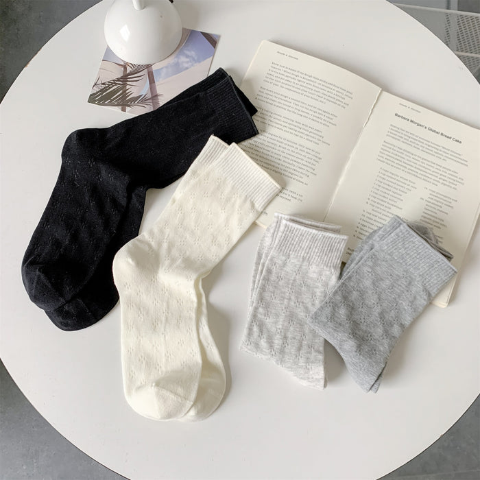 Wholesale Socks hollow mesh boneless pile socks solid color versatile mid length tube