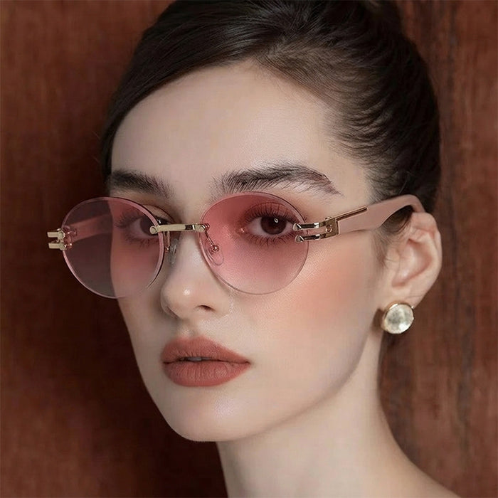 Wholesale Rimless Gold Frame Round Sunglasses UV400 Trendy Street Style for Women