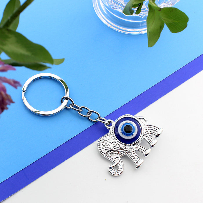 Wholesale Silver boat anchor, rudder, blue eyes, keychain, bag hanging