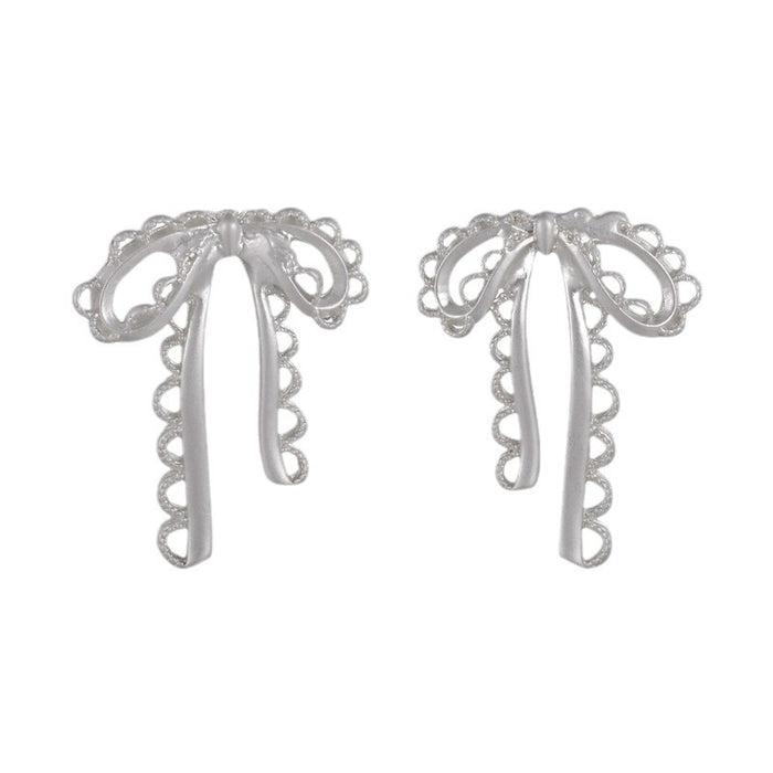 Wholesale Silver hollow bow earrings with a niche and high-end feel, designed earrings with a sense of sophistication