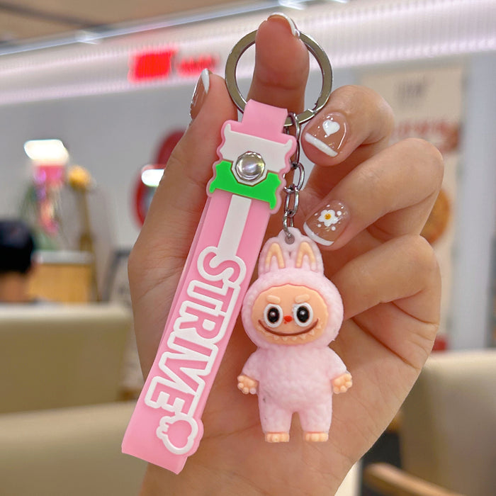 Wholesale Cute cartoon silicone keychain with cute little monster keychain for sweatshirt