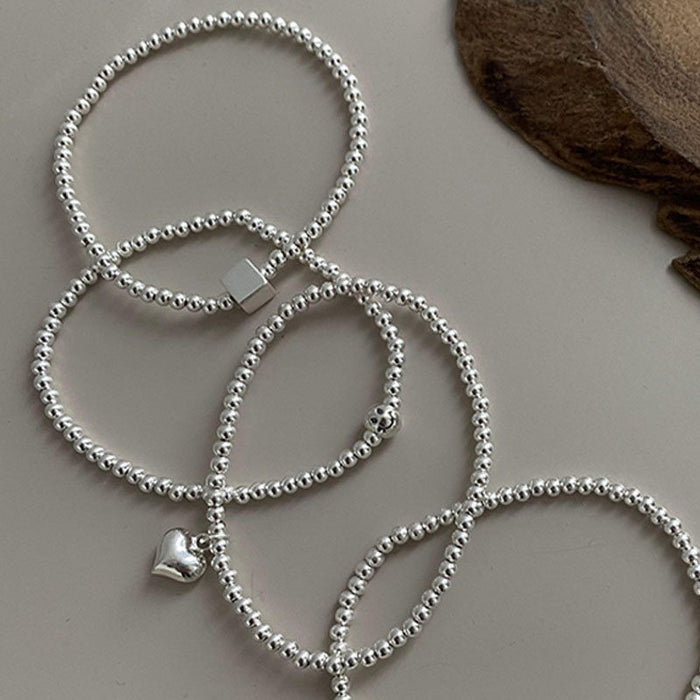 Wholesale Pure silver heart-shaped round bead bracelet with a new niche design, high-end feel, and light luxury bracelet accessories