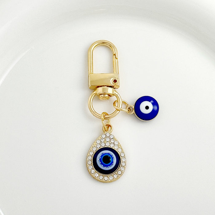 Wholesale Brilliant Diamond Blue Eyes Devil' s Eye Tassel Keychain Accessories Bag Pendant