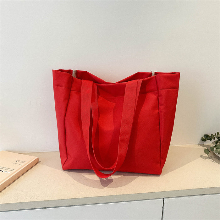 Wholesale Solid color large capacity canvas shoulder bag, simple commuting tote bag, shopping bag