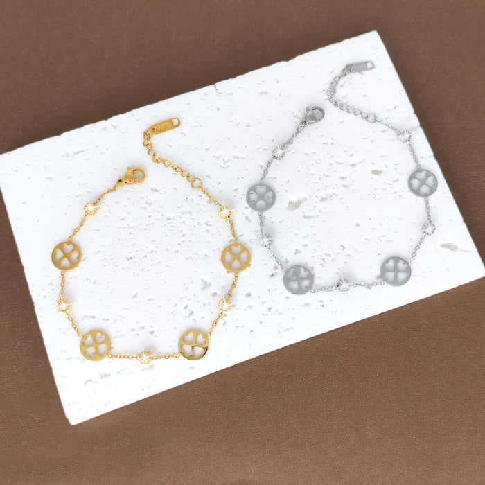 Wholesale New minimalist and fashionable stainless steel gold-plated, niche and versatile hollow out clover bracelet