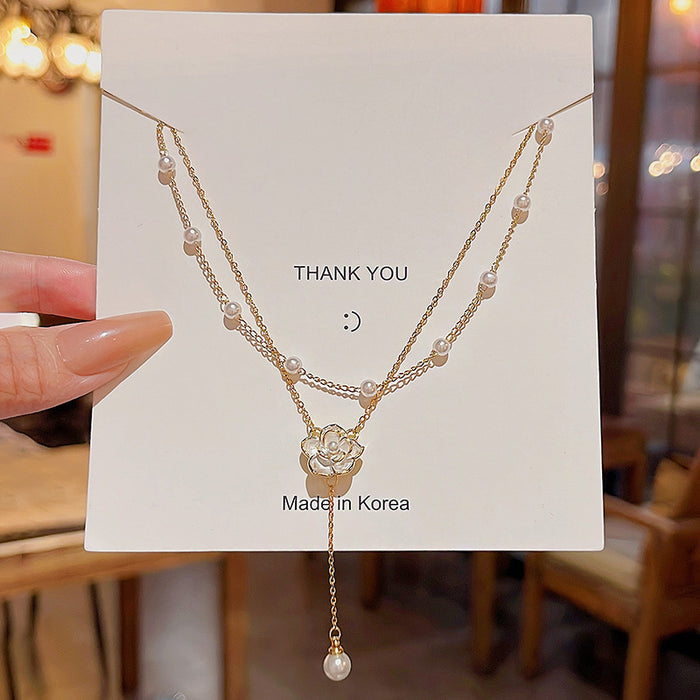 Wholesale Double layered tassel pearl necklace, niche design pendant, collarbone chain, high-end temperament, neck chain