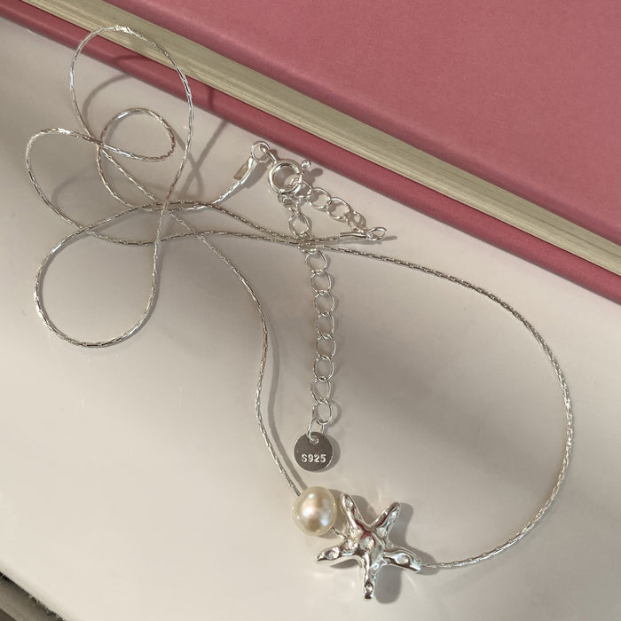 Wholesale Silver plated pearl necklace with high-end design, light luxury texture, collarbone chain