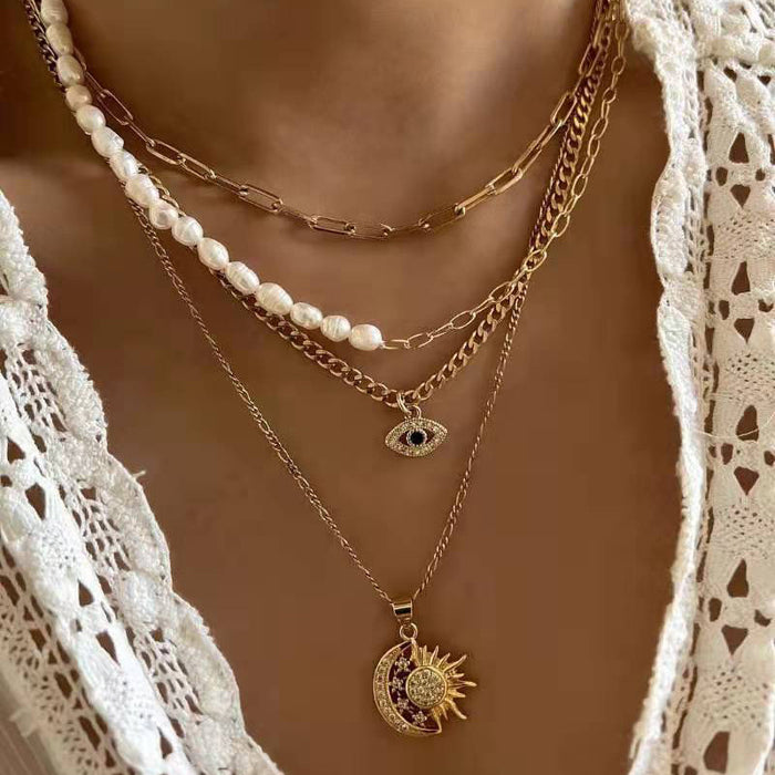 Wholesale New gold-plated pearl eye multi-layer necklace, fashionable street photography sweater chain