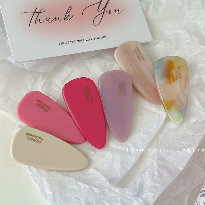 Wholesale Elliptical hair clip with side bangs, simple and elegant headband clip