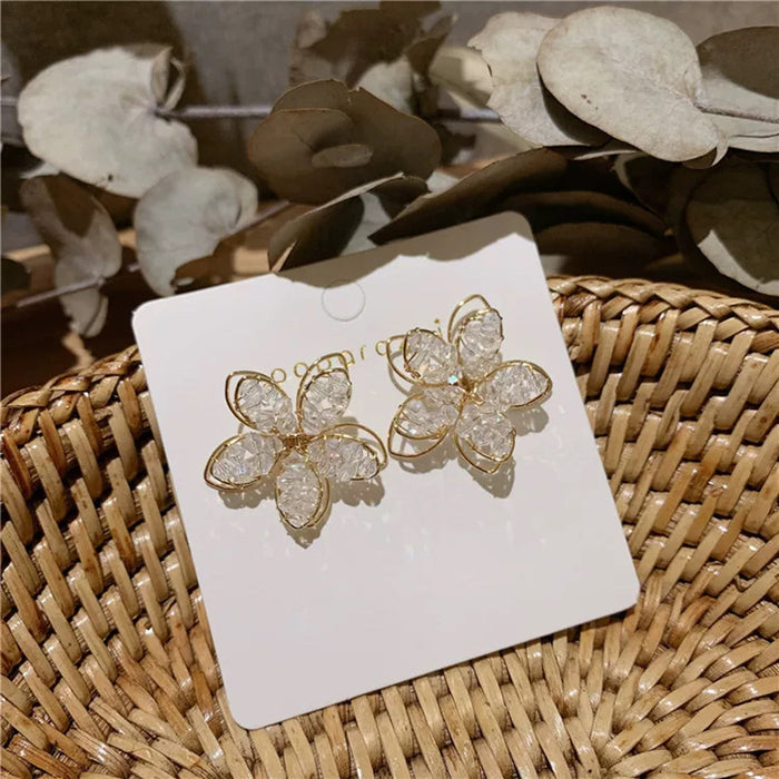 Wholesale Three dimensional flower earrings, silver needles, sparkling crystal earrings, earrings, pendants, earrings
