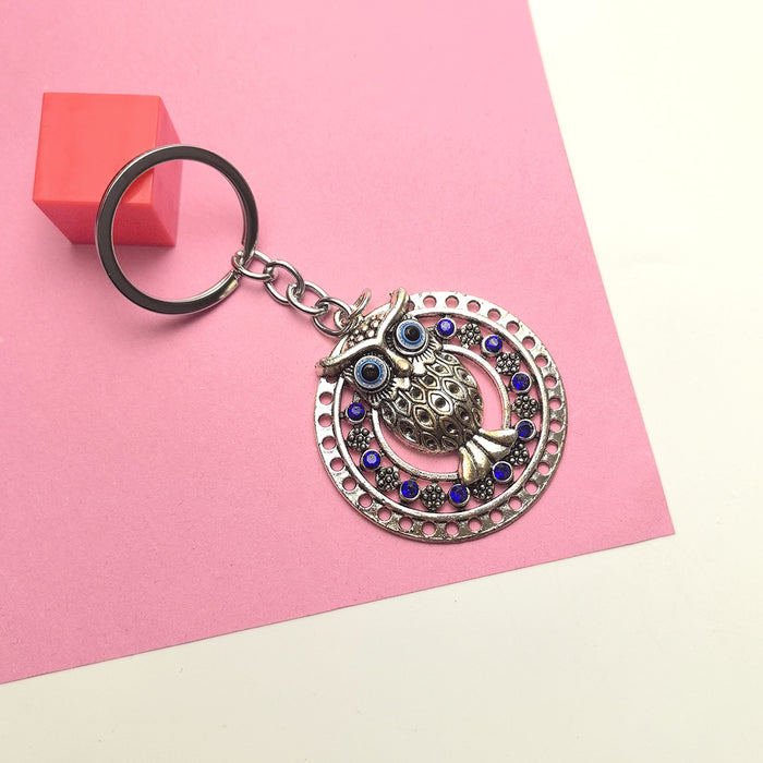 Wholesale Blue Eye Pendant Flower Butterfly Keychain Pendant Bag