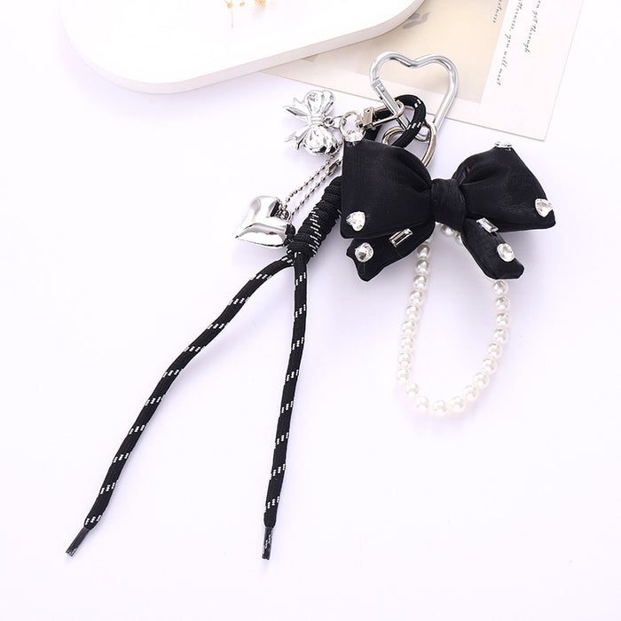 Wholesale Leather bow heart pendant luggage keychain lanyard accessories single buckle tassel pendant accessories