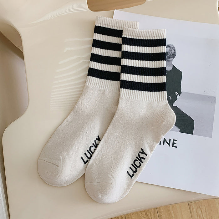 Wholesale Spring and Autumn Black and White High Elastic Alphabet Sports Middle Tube Women's Socks