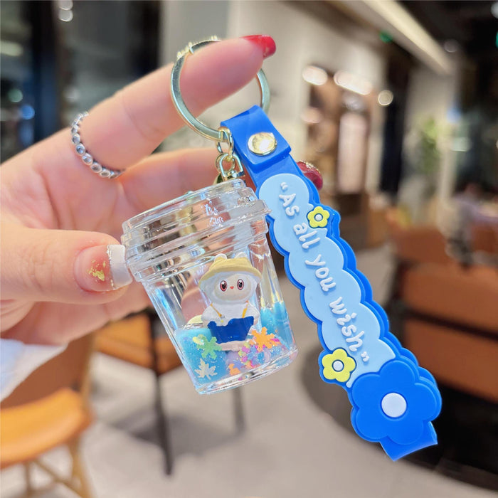 Wholesale Cartoon quicksand in oil blue keychain