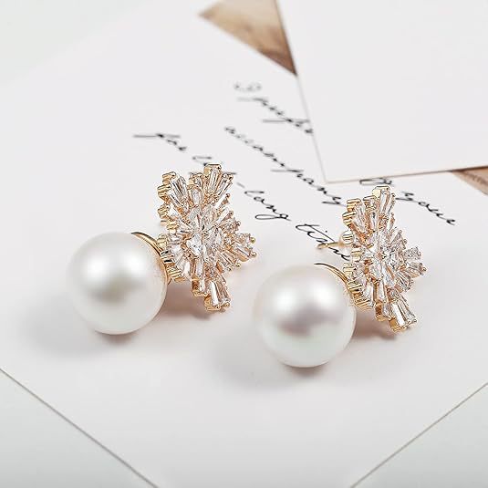 Wholesale Fashionable temperament, design sense, snowflake pearl earrings, pure silver needles, trendy earrings, earrings