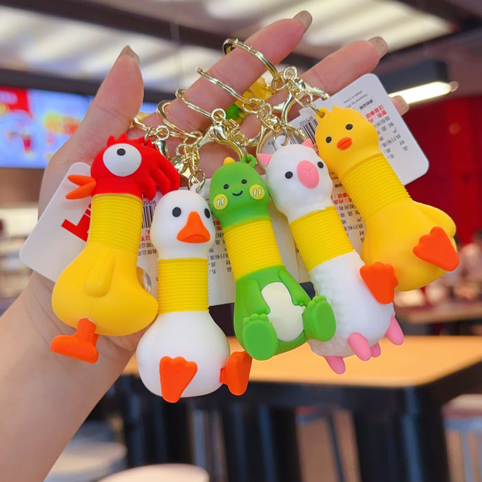 Wholesale Retractable animal pendant PVC doll keychain