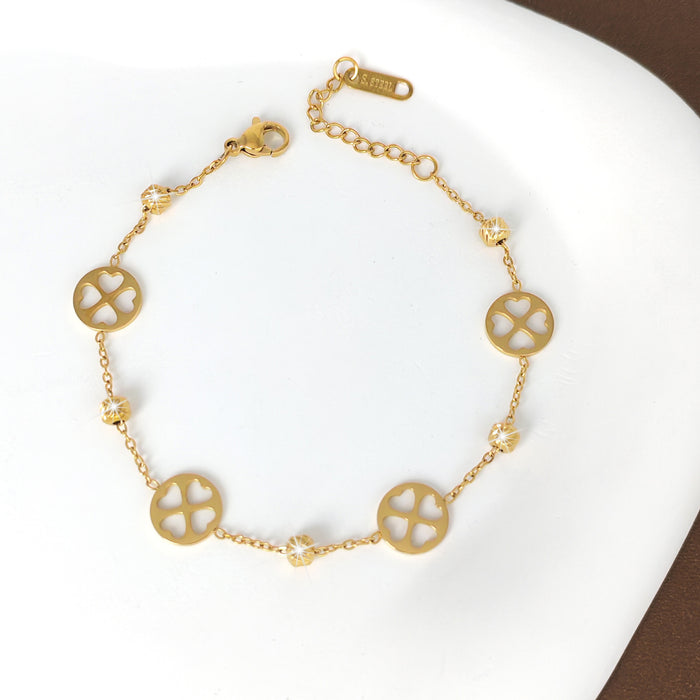 Wholesale New minimalist and fashionable stainless steel gold-plated, niche and versatile hollow out clover bracelet