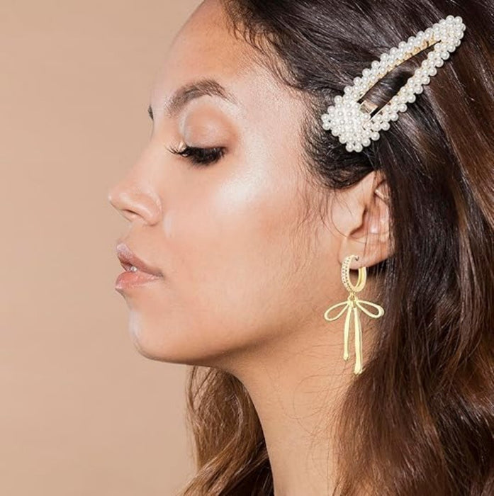 Wholesale Fashionable long bow pendant, ear buckle, ear ring, tassel shaped high-end earrings, brass genuine gold electroplating