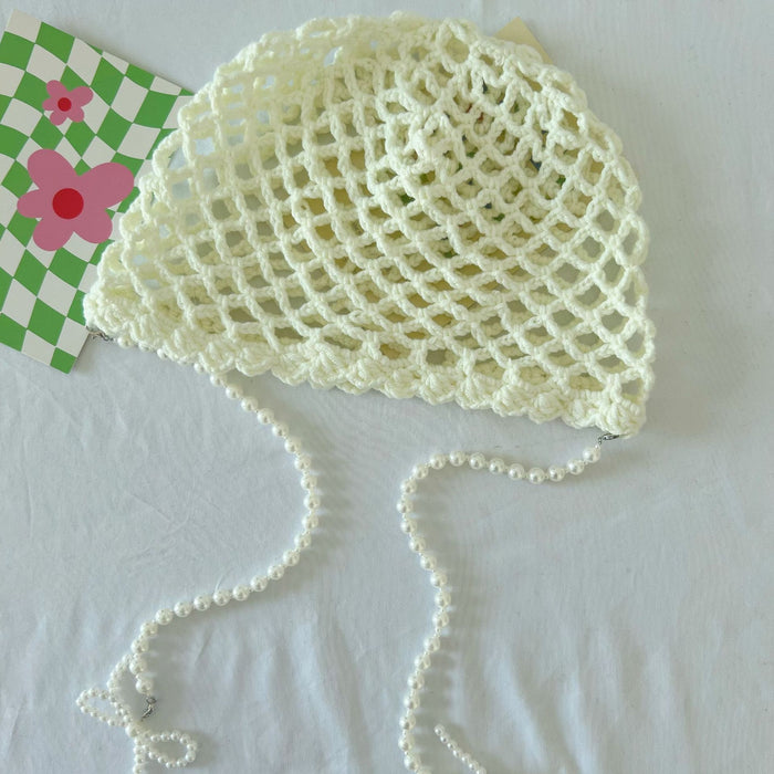 Wholesale Hollow out handmade crochet hat vintage pearl bow tassel travel versatile knitted hat