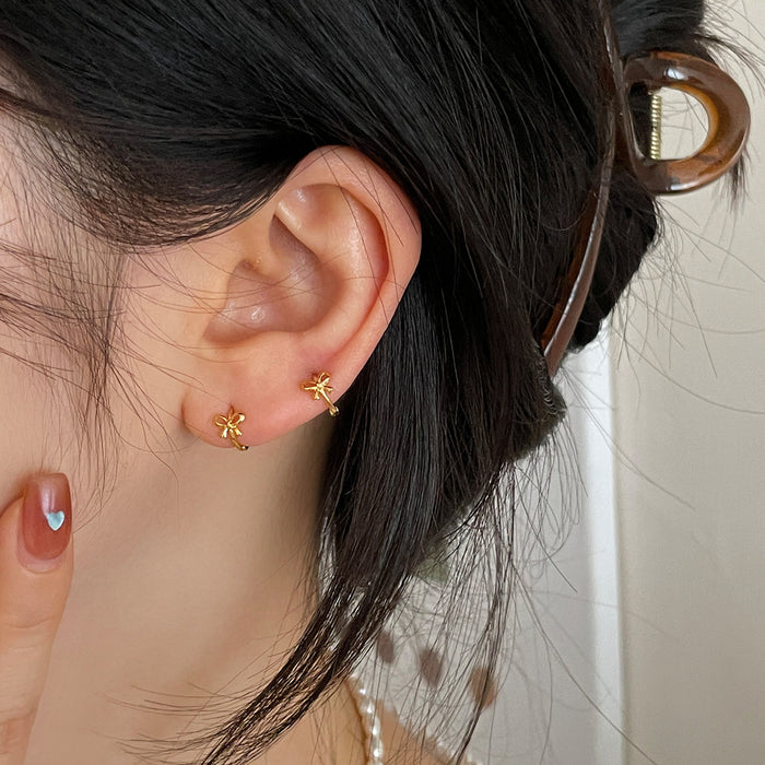 Wholesale Pure silver bow earrings with simple, compact, exquisite and niche design, high-end, natural and versatile new earrings